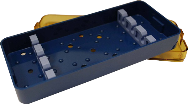Close-up of large sterilization tray with silicone inserts for surgical instruments