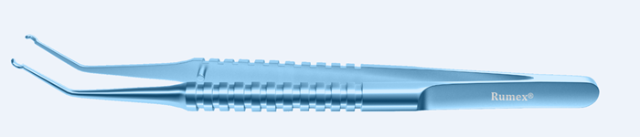 Titanium loading forceps in hand during eye surgery, showcasing fine tips for delicate procedures